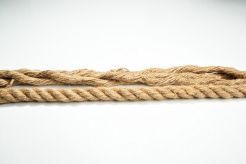 Closeup view of two straight ropes string isolated over a white background