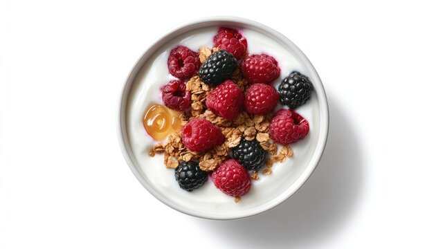 Fresh yogurt bowl topped with vibrant berries and crunchy granol