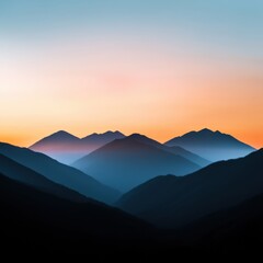 Naklejka premium Mountain range at sunset with clear sky