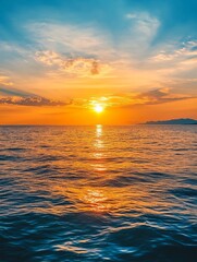 Obraz premium Stunning Ocean Sunset with Golden Reflections on Calm Waves