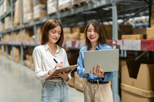 Female engineers team discussing inventory in warehouse logistics and supply chain planning, operation management, data analysis, warehouse shipping, inventory tracking, optimization and technology