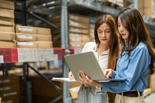 Female engineers team discussing inventory in warehouse logistics and supply chain planning, operation management, data analysis, warehouse shipping, inventory tracking, optimization and technology