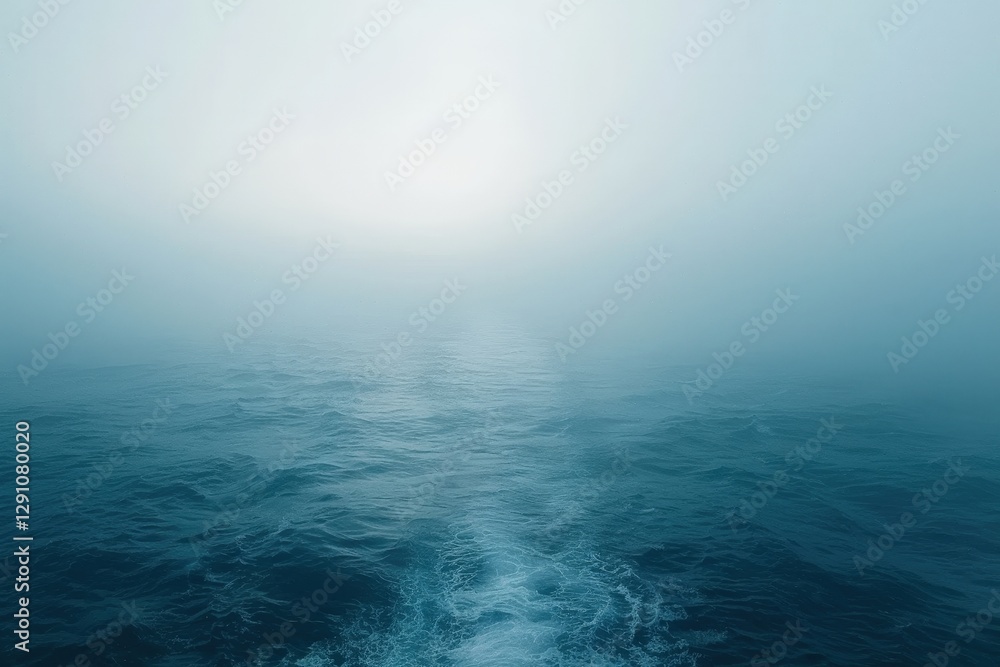 Poster a serene ocean scene shrouded in fog, creating a tranquil and mystical atmosphere with soft colors a