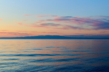 Dawn on Lake Alakol. Lake Alakol is a salt lake located in the Zhetysu and Abay regions of the Republic of Kazakhstan. Blur effect.