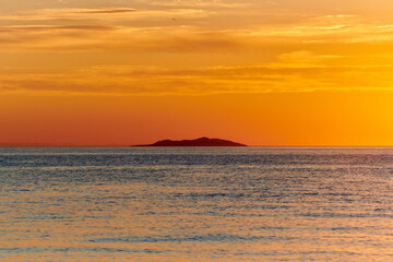 Dawn on Lake Alakol. Lake Alakol is a salt lake located in the Zhetysu and Abay regions of the Republic of Kazakhstan. Blur effect.