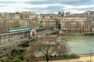 France, Paris, the train crosses the bridge Bir-Harkeim over the Seine river.	