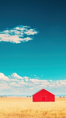 Serene Red Barn in Golden Wheat Field under a Vibrant Blue Sky with Fluffy Clouds A Stunning Rural Landscape Photograph