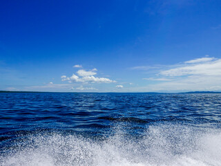 Traveling by speedboat towards Bocas del Toro. In the foreground, the gout of the outboard motor.