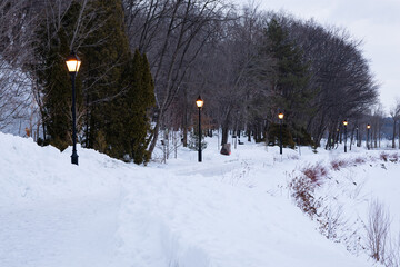 Early morning winter view of the Jacques-Cartier Walk along the St. Lawrence River, Quebec City, Quebec, Canada