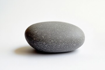Gray smooth stone on white background