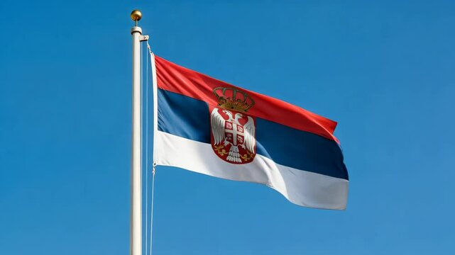 serbian national flag of waving on blue sky, banner of serbia on the wind
