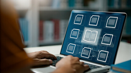 Person working on laptop with document icons overlay, library setting