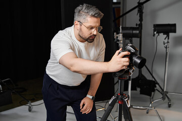 Creative professional captures artistic moments in a studio setting using a digital camera