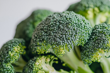 A close-up of fresh broccoli, isolated on a white background