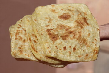 A close-up of the traditional Moroccan flatbread known as Msemmen or Msemen