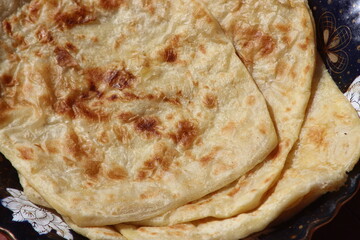 A close-up of the traditional Moroccan flatbread known as Msemmen or Msemen