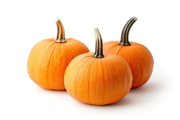 Three small pumpkins on white background