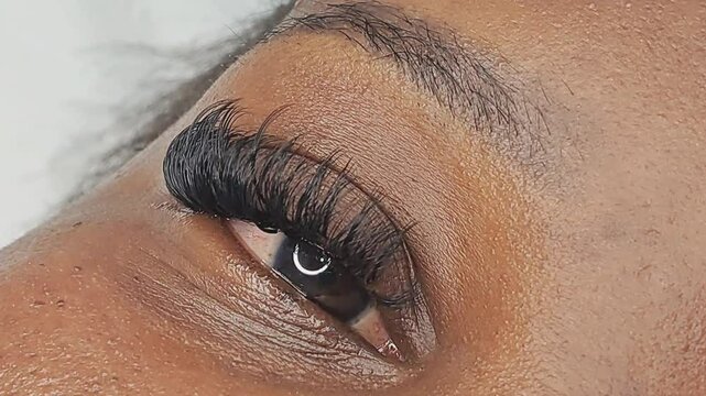  Close up of eye with eyelash extensions ,beauty salon treatment ,2d volume, 3d volume, classical lashes,Russian volume,megavolume, new set.