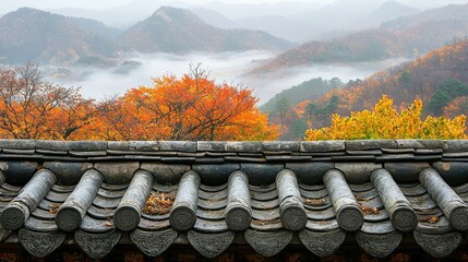Fototapeta premium Beautiful autumn scenery of mountains and a traditional roof
