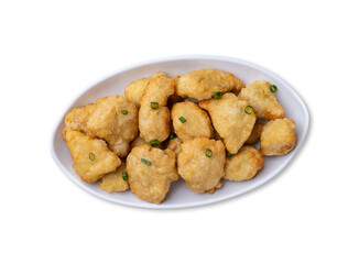 Breaded chicken bites in a plate isolated over white background