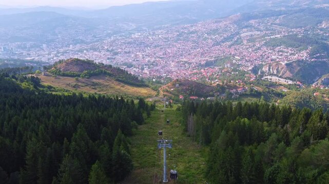 Aerial panoramic view of the city of Sarajevo, a tourist destination in Eastern Europe. View from a distance of the capital of Bosnia and Herzegovina