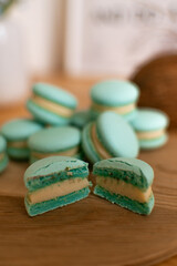 Blue macarons with coconut. Scandinavian kitchen.