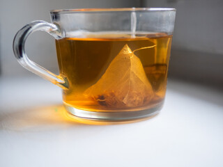 A cup of tea with a tea bag in it