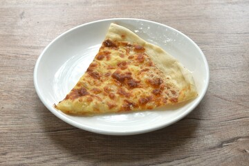 piece of baking homemade pizza topping truffle on plate 