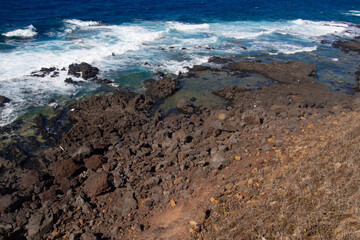Wild Rocky Coastline of Linosa Island, Sicily, Italy – Waves Crashing on Volcanic Shore