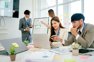 Group of people are working together in a conference room