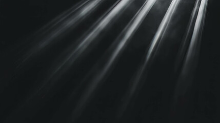 Dramatic light rays in high contrast background for creative design