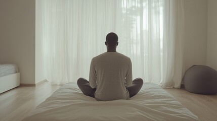 Hypertension patient practicing a short meditation session in a calm bedroom. Featuring mindfulness and relaxation