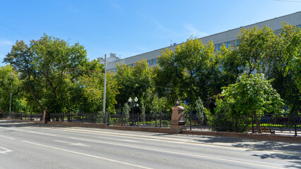 Square on Lenin Avenue on sunny summer day, Yekaterinburg, Russia. Landscaping in city center. Road markings