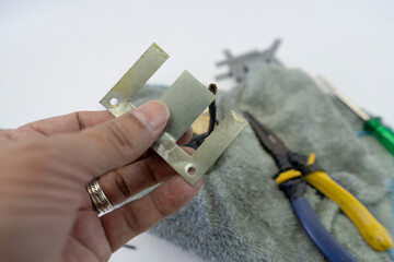 Disassembled Power Supply Transformer with Metal Parts and Wires