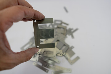 Disassembled Power Supply Transformer with Metal Parts and Wires