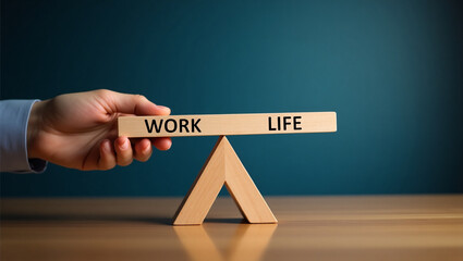 Work life balance concept. Wooden cube block with word LIFE and WORK on seesaw.