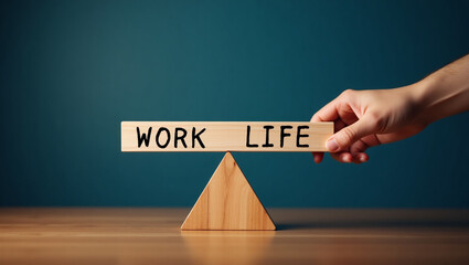Work life balance concept. Wooden cube block with word LIFE and WORK on seesaw.