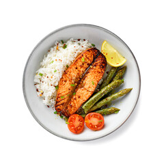 Baked salmon fish steak with asparagus fried rice and lemon slice. Delicious lunch or dinner for every day. Isolated on white  background, top view