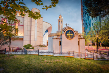 Illuminated evening view of Resurrection of Christ Orthodox Cathedral. Wonderful summer sunset in...