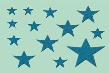 Flatlay with White and Blue Wooden Stars Sprinkled on a Blue Brocade Background. Funny Starry Party Layout.a bunch of wooden stars and one of them is highlighted in red. subject on blue background.