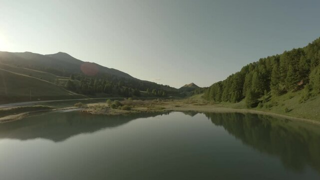 Drone shot of lake in Col de Vars mountain pass in the Alps between the departments of Hautes-Alpes