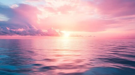 Fototapeta premium A beautiful ocean sunset reflecting a pink and purple sky
