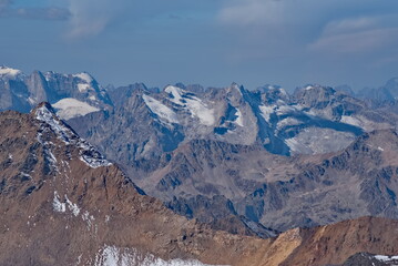Russia. Kabardino-Balkaria. A dizzying view of the mountain peaks of the Caucasus around Mount Elbrus (5,642 m) - the highest mountain in Russia and Europe.