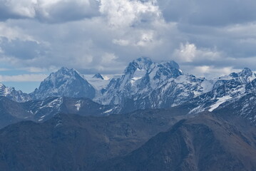 Russia. Kabardino-Balkaria. A dizzying view of the mountain peaks of the Caucasus around Mount Elbrus (5,642 m) - the highest mountain in Russia and Europe.