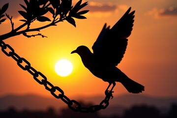 Fototapeta premium Majestic Bird Silhouette Taking Flight at Sunset Breaking Free from Chains