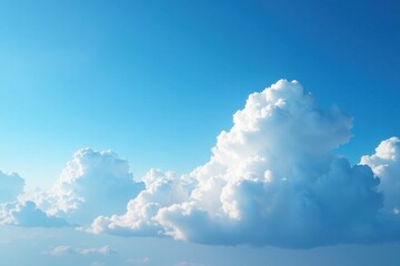 Immense, fluffy white clouds dominate a vibrant blue sky, breathtaking, serene