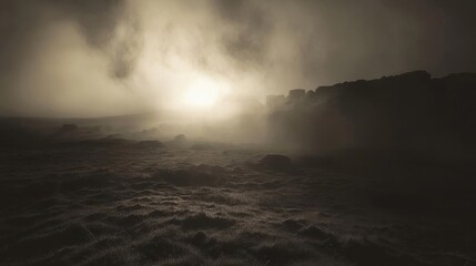 Obraz premium Moody Landscape Featuring Rocks And Mist In A Cloudy Evening