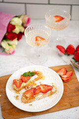 Bruschetta with strawberries. fried in batter toast with cream cheese