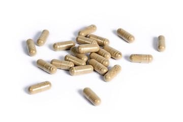 Arrangement of herbal capsules closeup