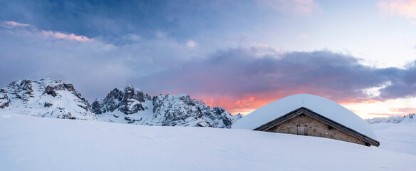 Snowshoeing to the Fevri malga on Mount Spinale. Easy snowshoe hike from Madonna di Campiglio (1h30/2h). Wonderful views of the Brenta Dolomites, Madonna di Campiglio, Trentino, Italy